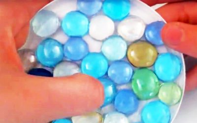 She Puts Gemstones Inside An Old Yogurt Lid Then Pours THIS On Top. When She’s Done It’s So AWESOME!