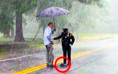 Couple Spot a Strange Police Officer In Torrential Rain. But They’re Stunned When They Realize What She’s Doing!